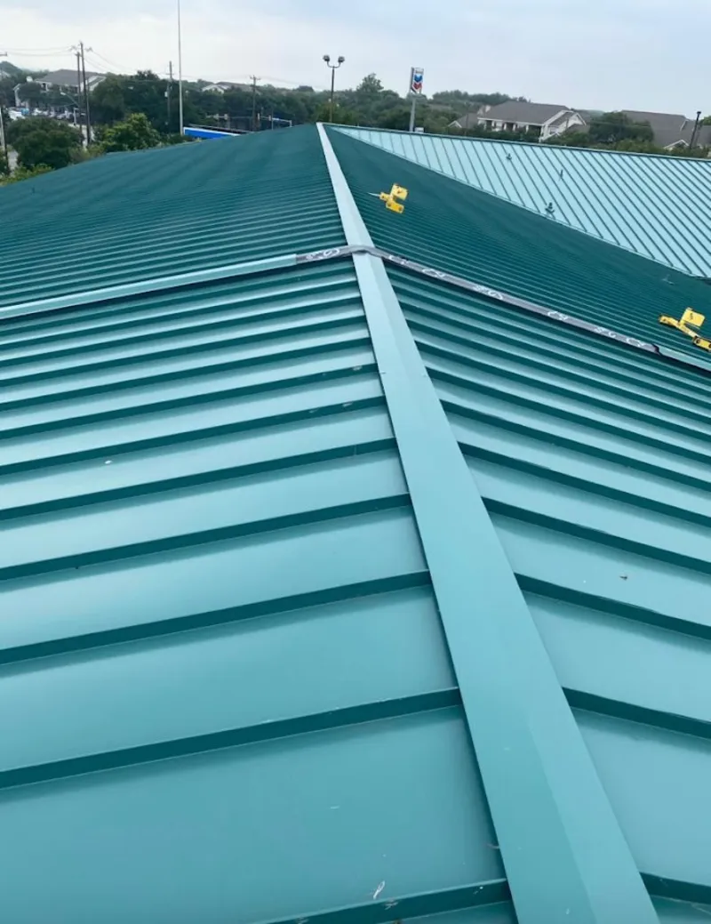 Green commercial metal roof ridge and valley for Metal Roof Repair in Mount Joy
